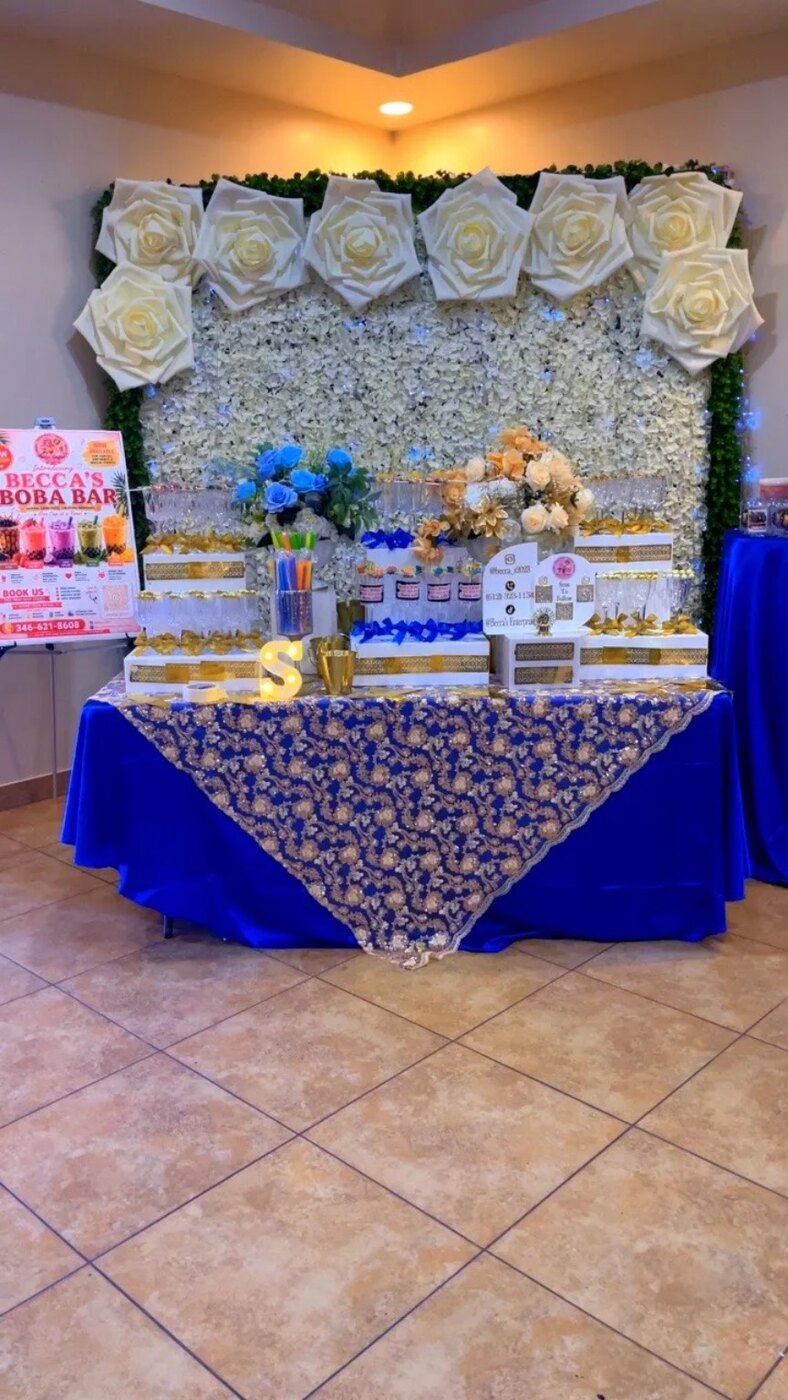 Blue and gold boba and treats table