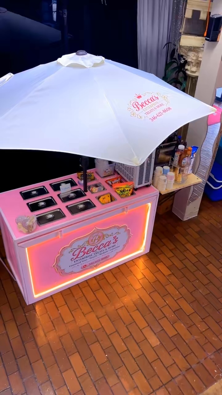 Detailed view of Becca's branded treat cart and umbrella